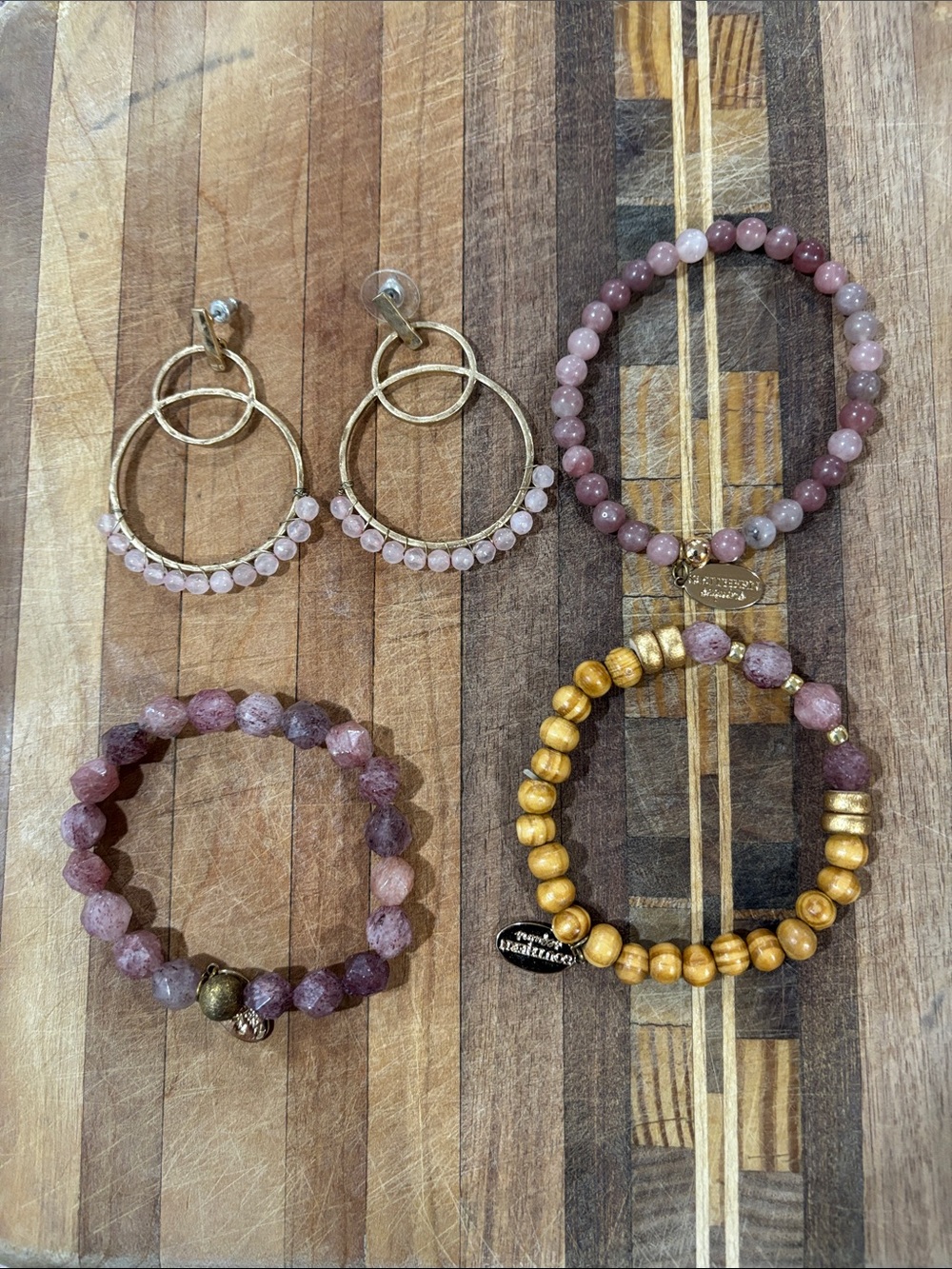 (3) beaded bracelets and (1) pair earrings